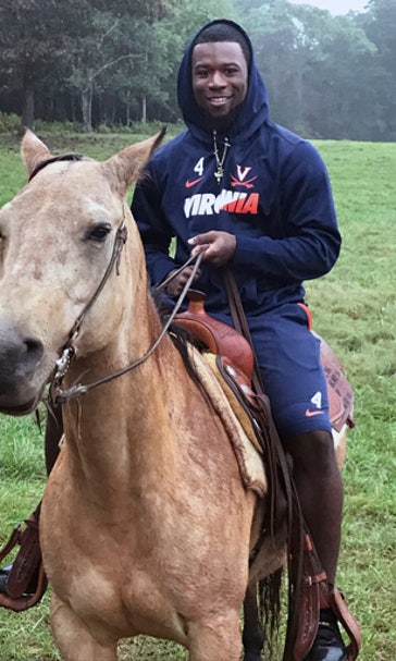 Team bonding: Virginia's Mendenhall hosts team at his ranch